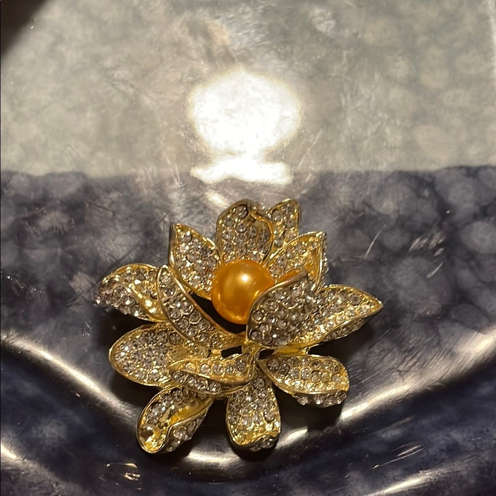 Elegant Gold and Silver Floral Brooch